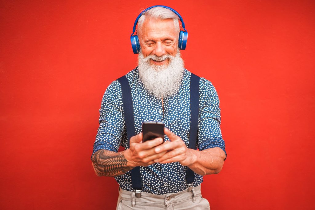 Man with iPhone displaying business communication in the modern world